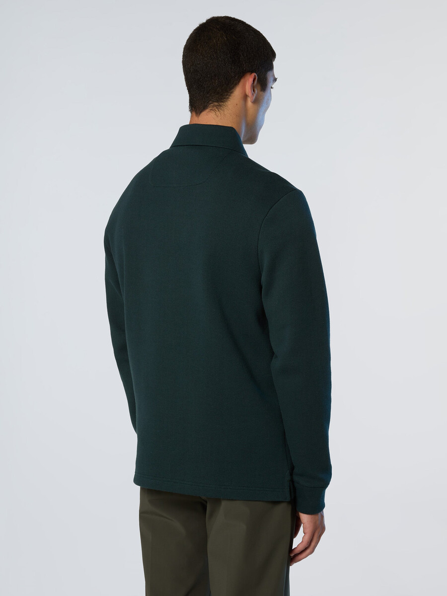 camisa polo con bolsillo en el pecho