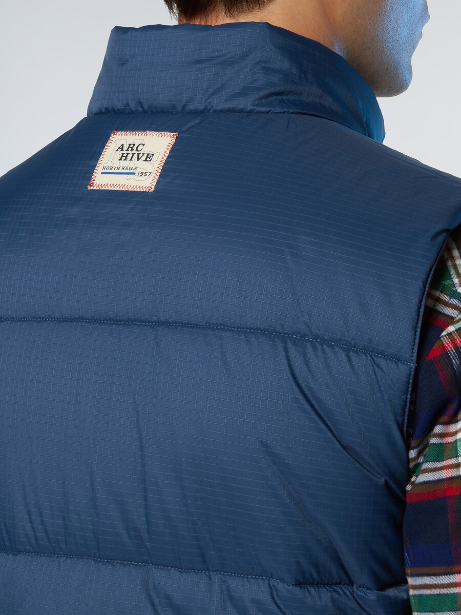 chaleco reversible shot